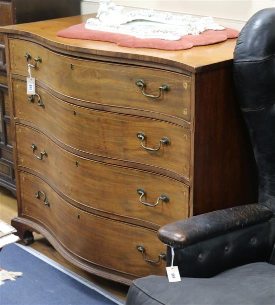 A George III inlaid mahogany serpentine chest W.112cm